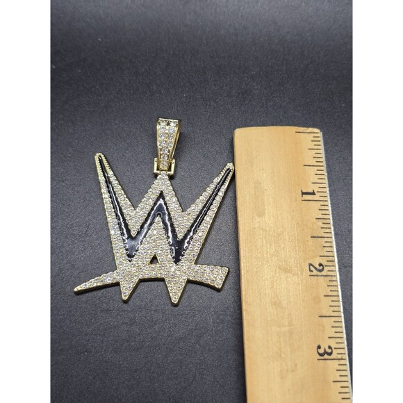 WWE GEM NECKLACE Charm Gold Tone Bling Pro-Wrestling Logo Pendant 2.5" X 2" - Picture 2 of 5